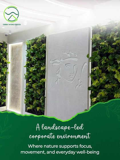 A detail of the landscape-led corporate environment at Prudential. The living walls are juxtaposed with artistic wall panels, creating a sophisticated interplay between nature and art that elevates the corporate aesthetic.