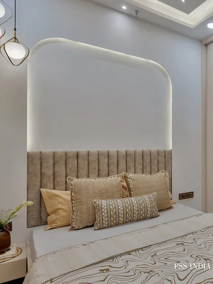Styling throw pillows is an art. Here, I mixed sizes, textures, and patterns within a cohesive color palette to make the bed look polished and inviting, demonstrating how small details can have a big impact.