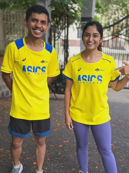 Celebrating top performance. Two of our dedicated runners showcasing their Asics finisher gear after achieving a top finish at the TCS 10K and qualifying for the Procam Slam.