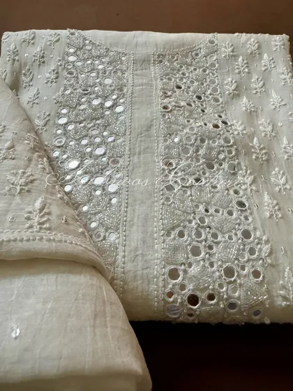A folded view of the kurta, perfect for appreciating the texture and craftsmanship of the mirrorwork.