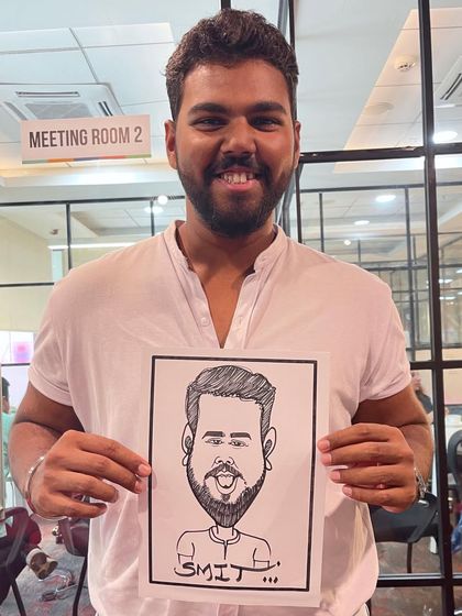 A guest from a corporate event in Gujarat. We travel all over India to bring our caricature services to your events.