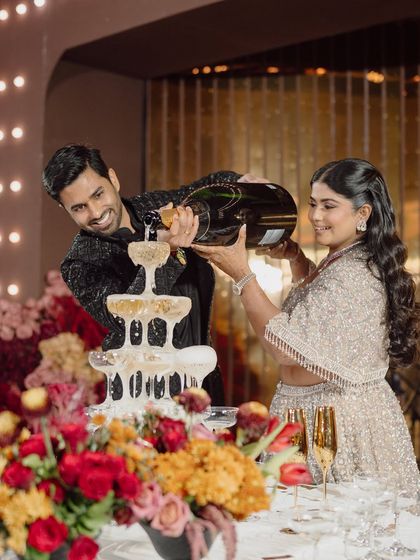 A classic champagne tower moment to kick off the evening's celebrations.