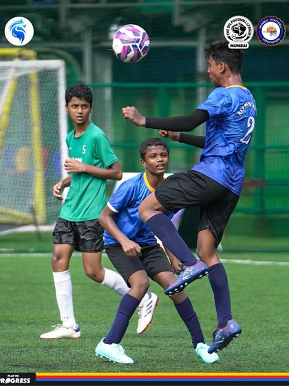 Three players contest a ball in the air, a testament to the fighting spirit instilled in our teams.