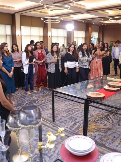 An engaged audience watches as I demonstrate a styling technique. My workshops are designed to be interactive, with plenty of opportunities for questions and learning.