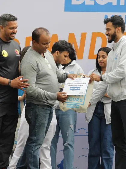 Our team helping distribute awards at a community sports event. It's a collective effort to make these gatherings successful and memorable for everyone involved.