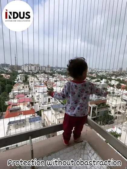 This image captures my core promise: protection without obstruction. A child can safely enjoy the balcony and the view, secured by high-tensile strength invisible grills. It’s the ultimate child safety solution for any high-rise apartment or home.