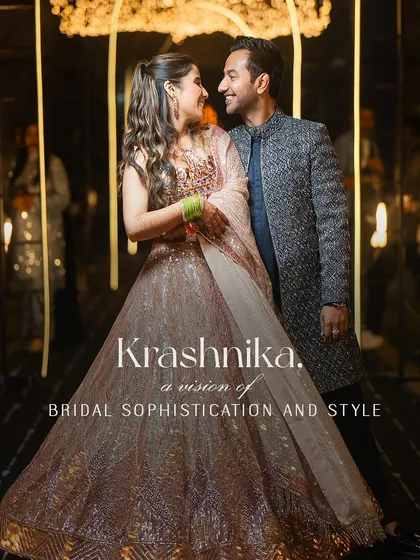 A vision of bridal sophistication and style. This portrait of the bride in her shimmering peach lehenga, with the groom by her side, captures the essence of their glamorous Sangeet look.