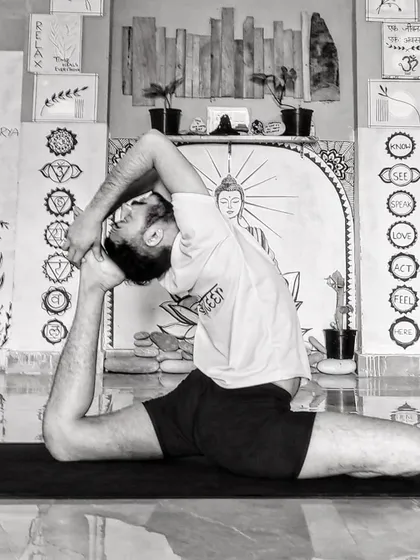 Nishant Sir demonstrating Eka Pada Rajakapotasana, a deep backbend and hip-opening asana.