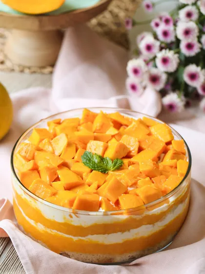 My Mango & Cream Cheese Trifle, layered with fresh, juicy mango chunks and light, airy cream. A true taste of the season.