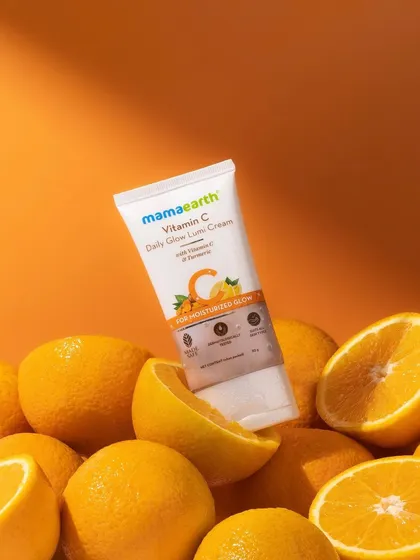 Color and composition are everything. We created a bed of fresh oranges to cradle this Vitamin C cream, using a single, strong light source to cast dramatic shadows that make the product pop. This is how we turn ingredients into art.