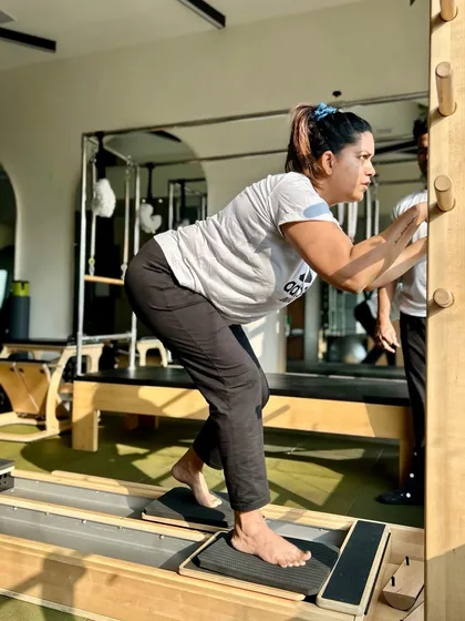Working on the ladder barrel is great for spinal mobility and stretching. Here, we're focusing on control and alignment.