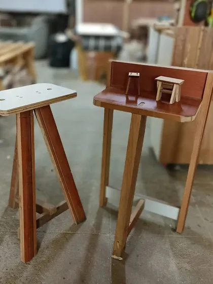 A comparison between a full-sized prototype stool and a miniature model. Making miniatures is a great way to test a design before committing to a full build.