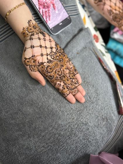 The same design from a wider angle, showing how it elegantly covers the back of the hand.