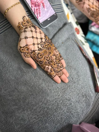 The same design from a wider angle, showing how it elegantly covers the back of the hand.