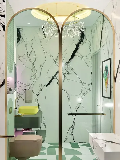 A kids' bathroom concept with arched, tinted shower doors. The design uses a mix of panda marble and geometric green tiles for a playful yet sophisticated look.