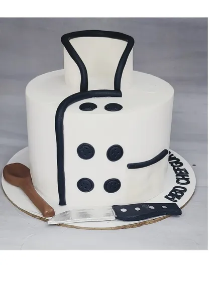 A cake designed to look like a chef's uniform. This chocolate truffle indulgence cake is a perfect tribute for a professional chef's birthday.