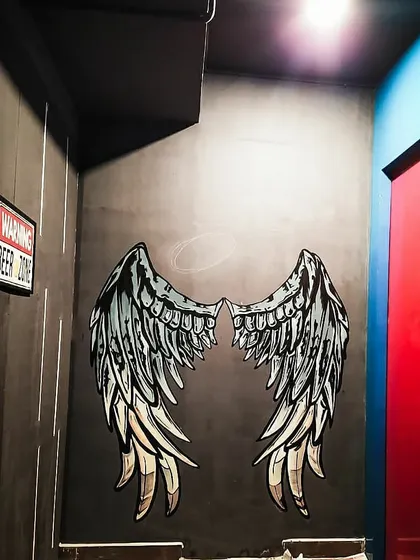 The completed angel wings at Westeros, HSR, ready for their close up. We make sure the lighting and placement are perfect to create a go-to photo corner.