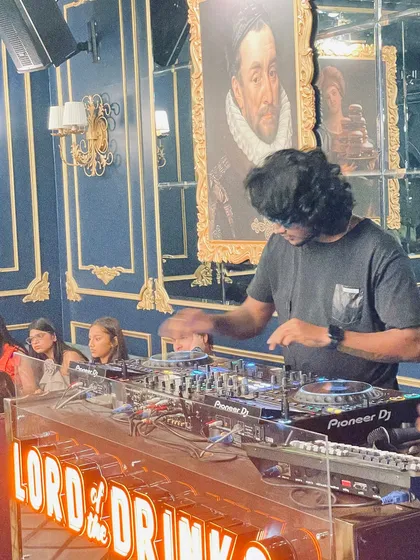 A candid shot of me working the Pioneer DJ decks, fully concentrated on crafting the perfect set.