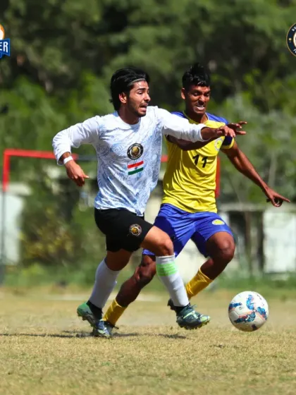Racing down the wing. A player uses their pace to beat a defender and advance into the attacking third.