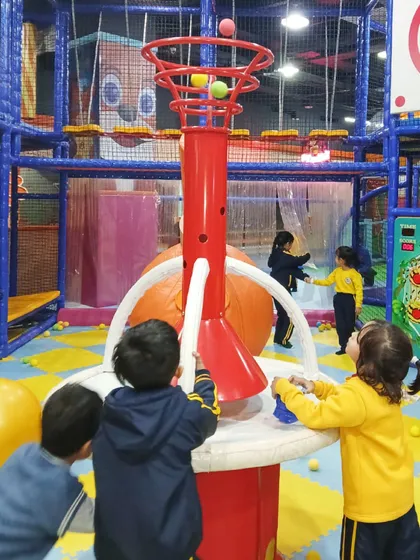Students work together at the ball volcano, a fun and interactive attraction that is always a highlight of any school visit.