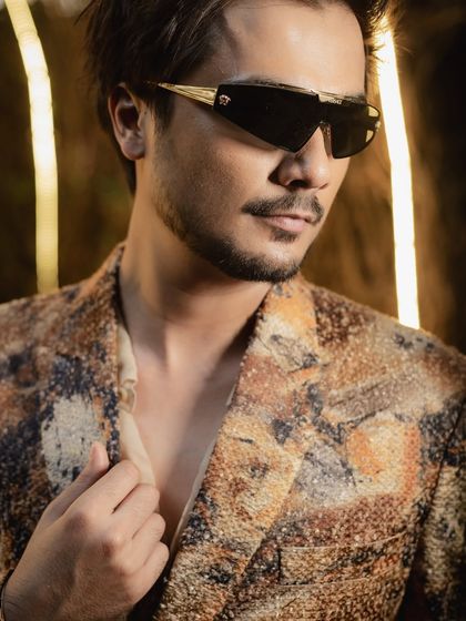 A cool and confident groom portrait from a cocktail party. We make sure to capture individual portraits that reflect your personality.