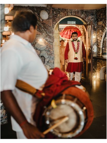 The groom's arrival at a South Indian wedding, accompanied by traditional music. We capture the cultural richness and vibrant sounds of the celebration.