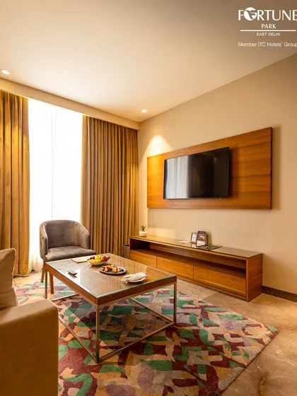 Our deluxe suites include a separate, comfortable living area. It’s an ideal space to unwind on the sofa, catch up on work, or entertain a guest.