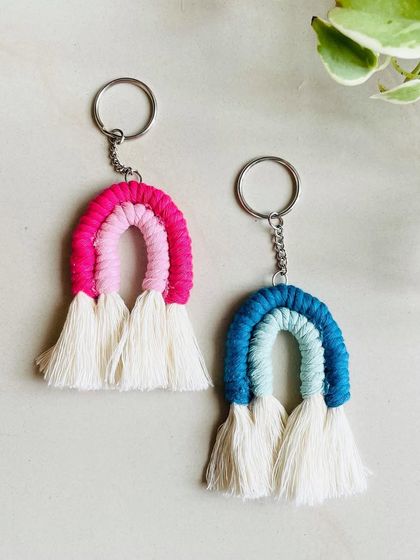 My mini rainbow keychains are perfect for those who want a smaller charm. They come in pink and blue variations and are super cute.