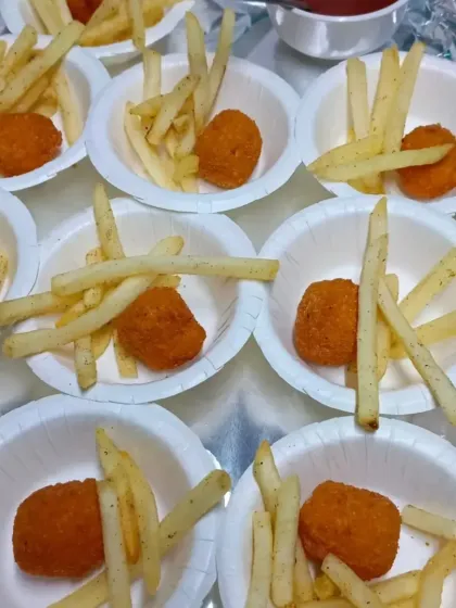 A kid-friendly favorite from our starter menu: crispy Cheese Corn Balls served with a side of masala French Fries.