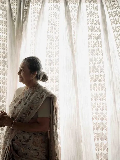 A graceful portrait of her, looking out the window. There is a serene and timeless beauty in her expression, a quiet strength that I wanted to capture.