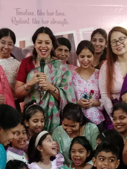 A beautiful, happy moment surrounded by guests and their children at a Tanishq event. My goal is to create a joyful and inclusive atmosphere where everyone, from adults to kids, feels part of the celebration.