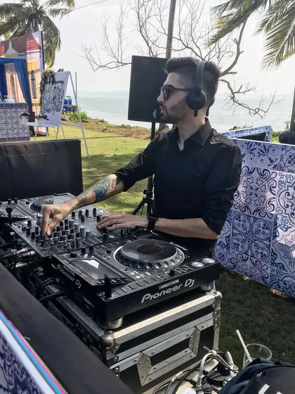 Setting the vibe for a beautiful beachside wedding event in Goa. As a destination wedding DJ, I'm experienced in setting up in unique outdoor locations and curating the perfect soundtrack for a celebration by the sea.