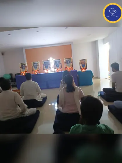 A group meditation during our Guru Purnima celebrations. On this sacred day, we gather with special reverence to honor the lineage of spiritual masters who guide us from darkness to light.