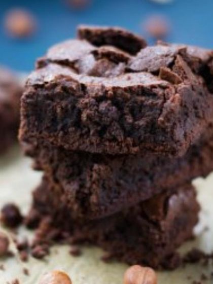 A stack of our rich and fudgy chocolate brownies. Made with high-quality chocolate, these are always a crowd-pleaser and can be included in any dessert platter.