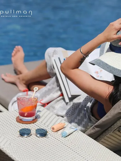 A moment of pure leisure at Pullman Hotels. Relax on a sun lounger with a cool drink and your favorite book, and let the poolside ambiance wash your stress away.