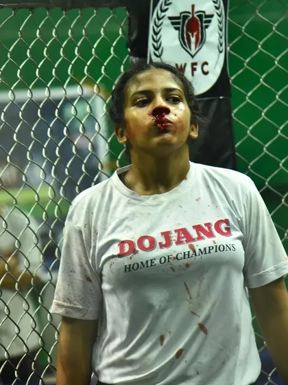 Bleeding but never broken. This fighter's heart is incredible. Even with a bad cut, she wanted to continue. As a coach, my first job is to protect my fighters, even from their own toughness.