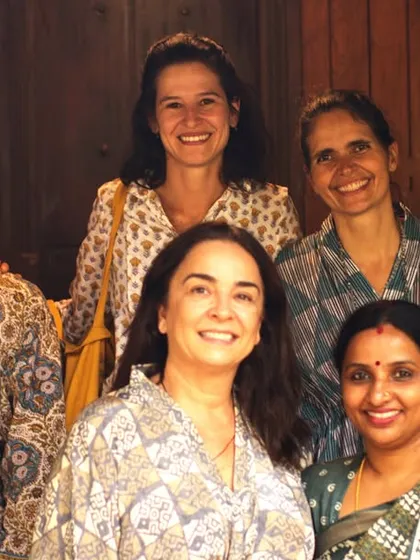A group photo capturing the happy faces during a guest's birthday celebration. It's a beautiful mix of guests and our dedicated staff, who truly become part of our guests' journey.