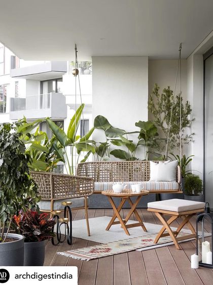 The lush, green balcony of the KAIA home, featured in Architectural Digest, is a perfect example of how we extend the living space outdoors, creating a serene retreat in the middle of the city.