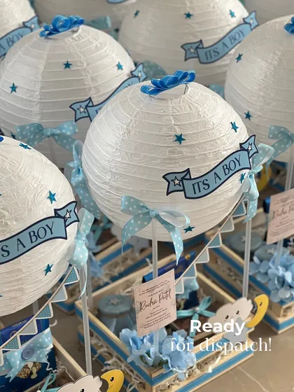 When a client asks for 150 baby announcement hampers, the studio turns into a sea of joy! This was for the 'Cloud Nine' theme, where we created these hot air balloon gifts to share the happy news. It shows how I handle large, custom orders with the same love and attention to detail.