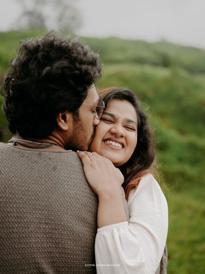 A sweet kiss on the cheek for Sanchana from Adarsh.