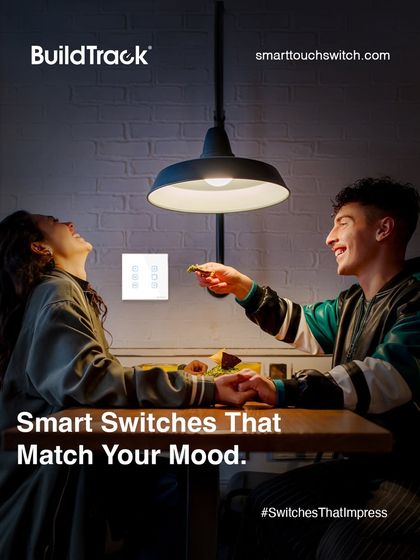 Our smart switches match your mood. This image captures a couple enjoying a dinner date at home, with the lighting perfectly set to create a romantic and intimate atmosphere, all controlled by our system.