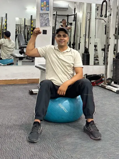Using a stability ball for a seated pose.