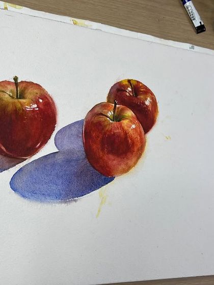 The apple still life shown on my easel. This view shows the simplicity of the setup, which is ideal for a beginner's lesson.