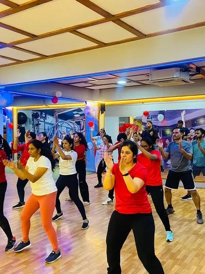 The whole group clapping and moving to the beat during our Christmas fitness party. The energy in the room was absolutely electric.