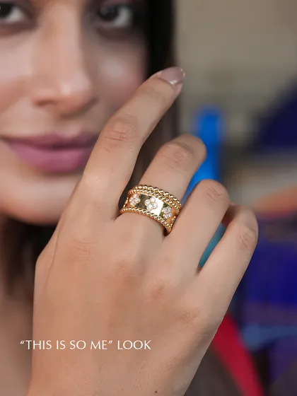 The "this is so me" look is what I strive for in my custom work. This wide gold ring features a beautiful quatrefoil diamond pattern with a beaded edge, worn with confidence. It is a piece that is both modern and timelessly personal.