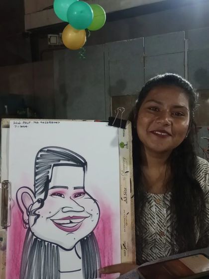 A guest from the same birthday party, very pleased with her colorful caricature.