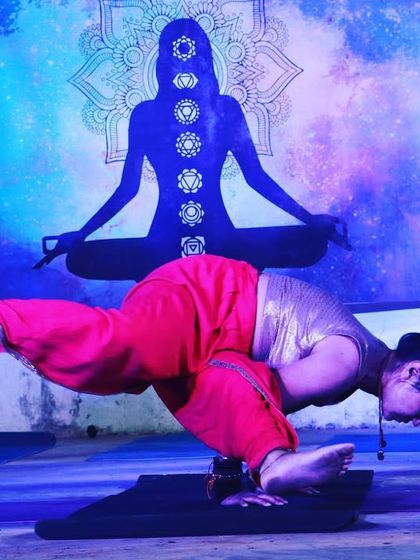 "The attitude of gratitude is the highest yoga." A moment of balance and strength in an arm pose during a performance.
