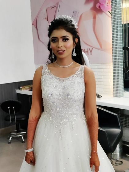 Another angle of this beautiful client, showing how the makeup and hair come together for a complete, polished look perfect for an evening reception or cocktail event.