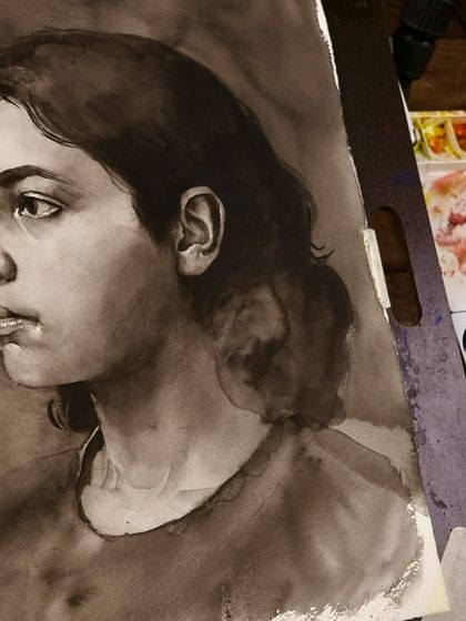 A work-in-progress shot of the monochrome portrait, shown next to my palette. This was a demonstration on value study for my online workshop.