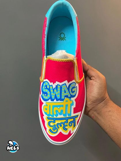 A top-down view of the "Swag Wali Dulhan" sneaker, showcasing the vibrant Hindi lettering.